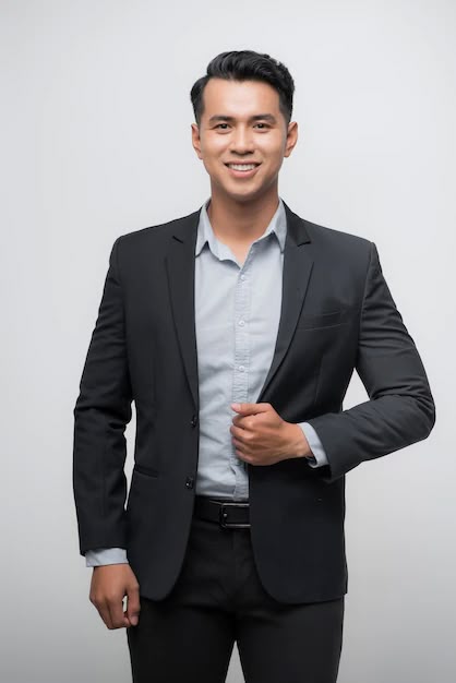 Premium Photo _ Happy Asian boss manager business man wears black suit in relax pose_